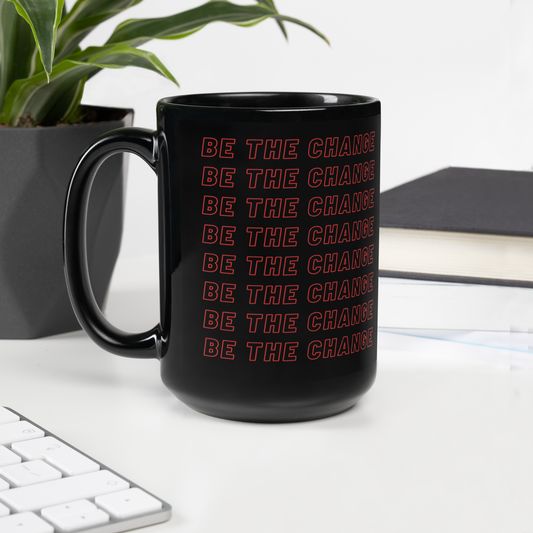 'Be The Change' black mug